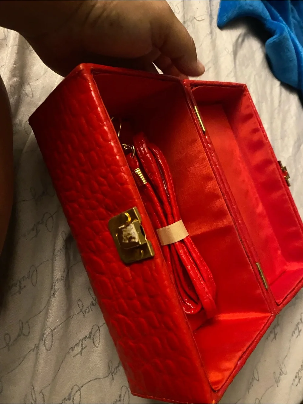 Red Textured Cosmetic Jewelry Case with Gold-Tone Clasp